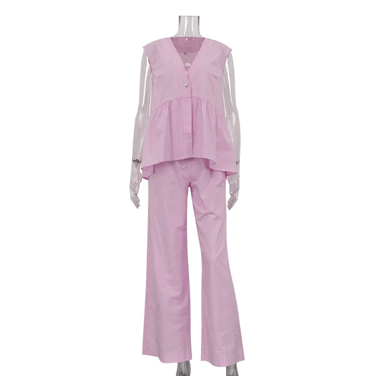 Conjunto de 2 piezas para mujer en algodón 100 %, compuesto por una blusa de cuello en V y diseño asimétrico —más corta por delante y más larga por detrás— y pantalón largo. Diseño casual, ligero y transpirable, i