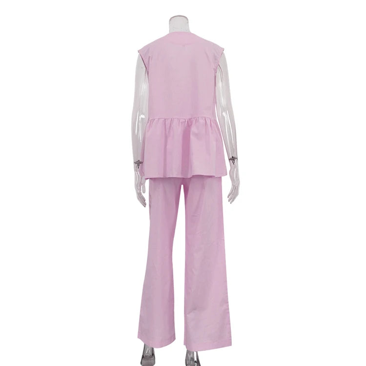 Conjunto de 2 piezas para mujer en algodón 100 %, compuesto por una blusa de cuello en V y diseño asimétrico —más corta por delante y más larga por detrás— y pantalón largo. Diseño casual, ligero y transpirable, i