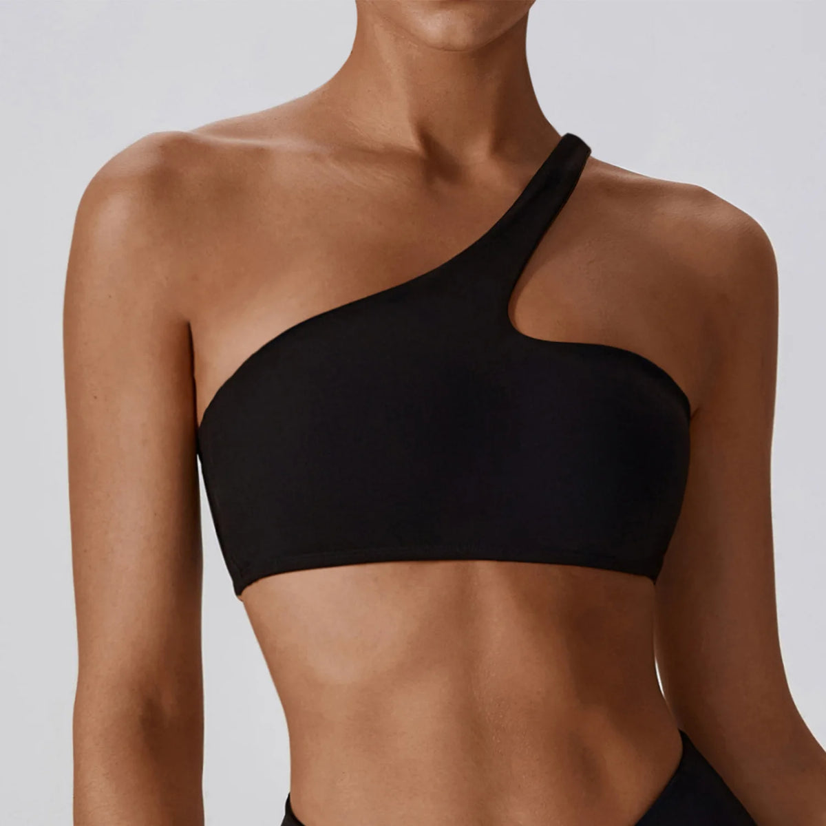 Conjunto deportivo femenino de 2 piezas – Leggings de cintura alta y top de un solo hombro

* Secado rápido
* Cintura alta con diseño en V
* Tejido elástico
* Ideal para gimnasio, fitness y entrenamiento
* Conjunto de 2