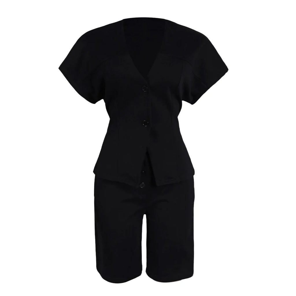 Conjunto de pantalón de 2 piezas para mujer

Conjunto a juego liso con chaqueta abotonada de manga corta, cuello en V, cintura alta y pantalón amplio hasta la rodilla. Corte holgado. Colección otoño 2026.