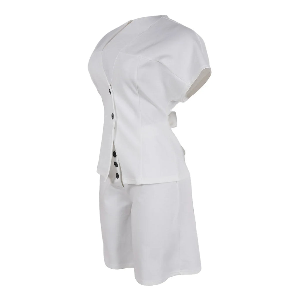 Conjunto de pantalón de 2 piezas para mujer

Conjunto a juego liso con chaqueta abotonada de manga corta, cuello en V, cintura alta y pantalón amplio hasta la rodilla. Corte holgado. Colección otoño 2026.
