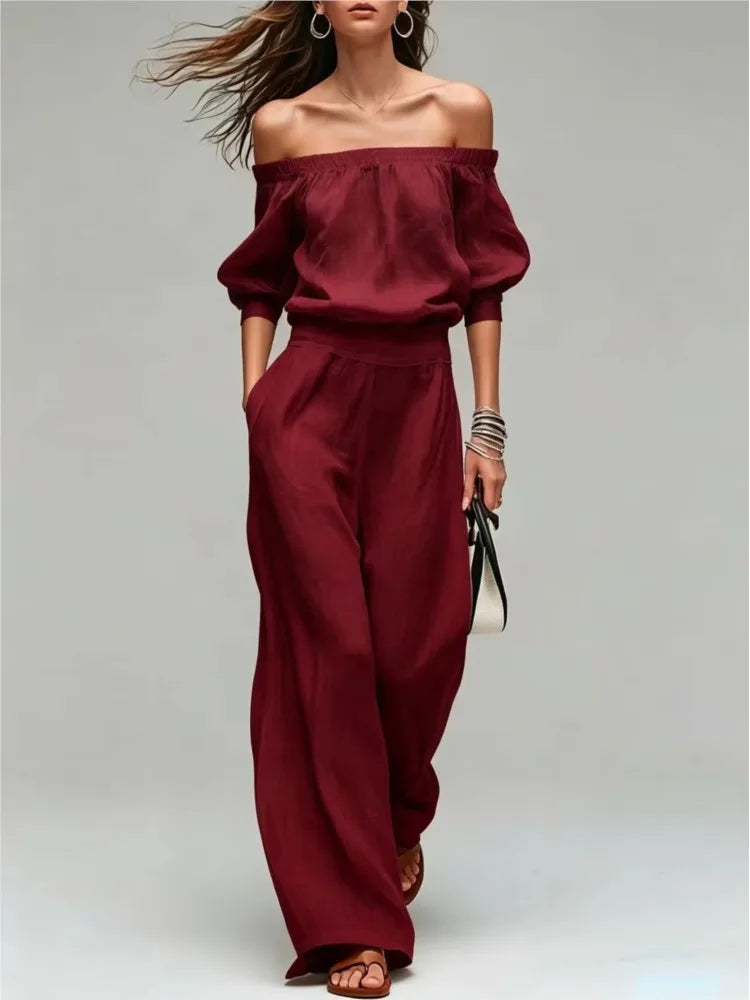 Conjunto de 2 piezas de verano: top de un solo hombro con cintura ajustada y pantalón de pierna ancha. Diseño elegante y moderno en color liso, ideal para looks casuales, vacaciones y fiestas.