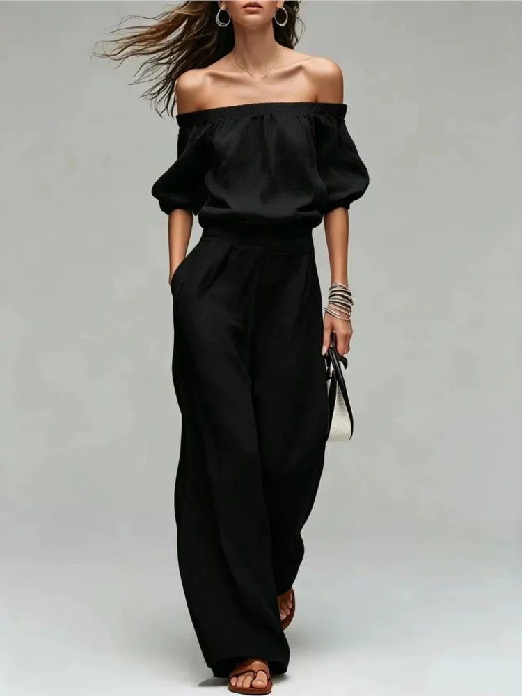 Conjunto de 2 piezas de verano: top de un solo hombro con cintura ajustada y pantalón de pierna ancha. Diseño elegante y moderno en color liso, ideal para looks casuales, vacaciones y fiestas.