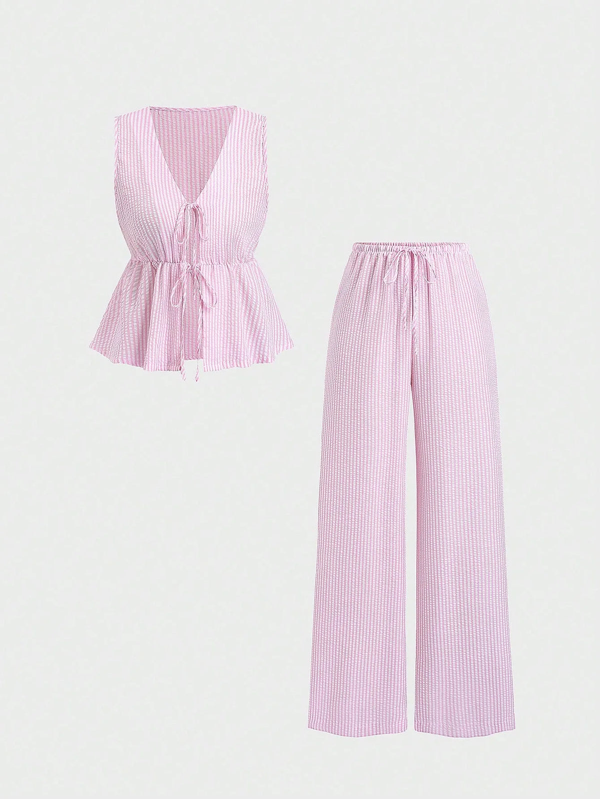 Conjunto de 2 piezas de rayas – Blusa de cuello V y pantalón de pierna ancha

Estilo: Casual / elegante
Temporada: Primavera-Verano
Tipo: Conjunto de pantalón
Detalles: Rayas · cuello V · cordones · sin mangas · cintu